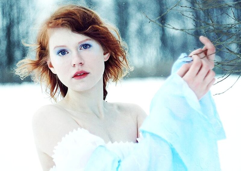 Woman in winter landscape