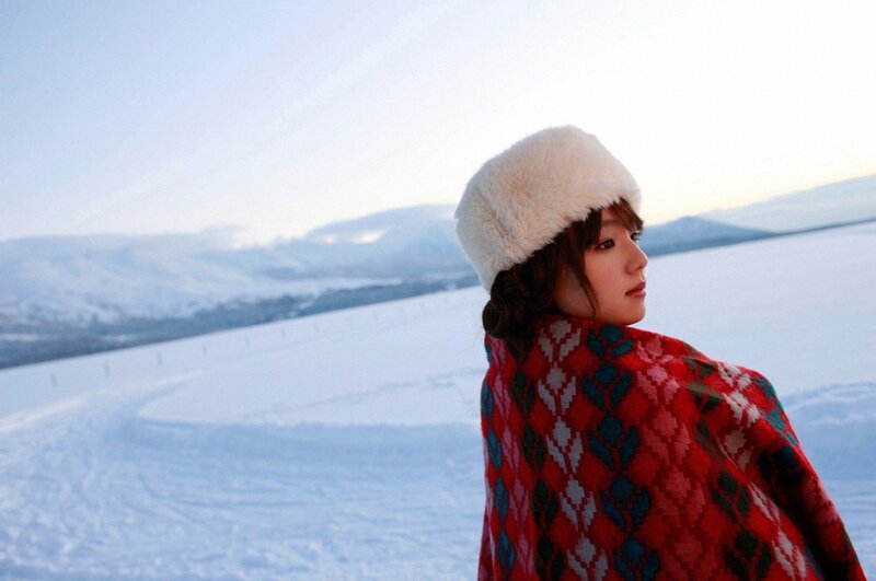 Woman in winter landscape