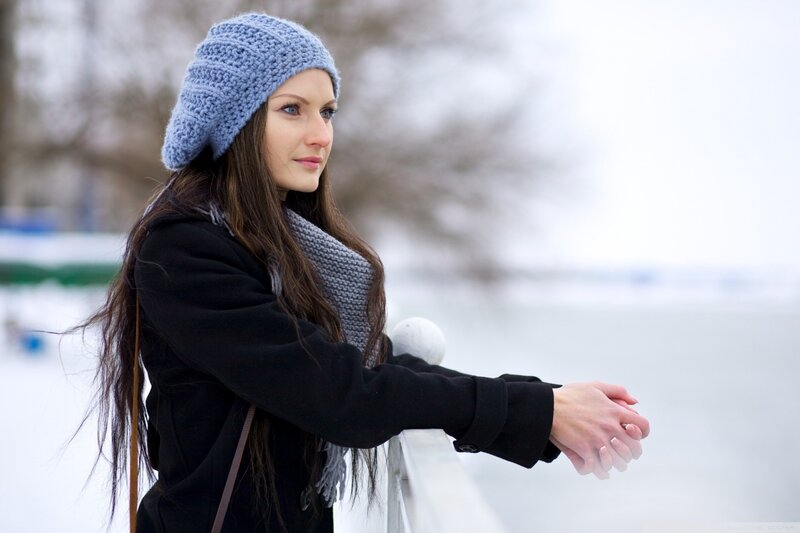 woman in winter on a bridge