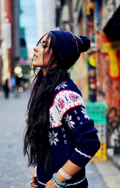 woman in winter sweater and beanie