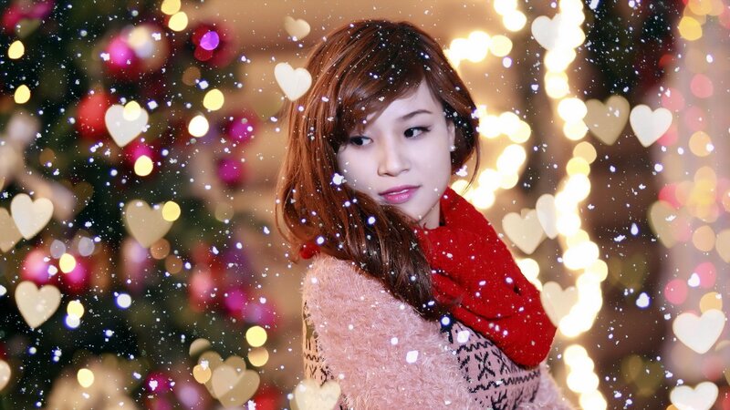 woman in winter with lights