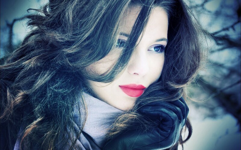 woman in winter with red lips