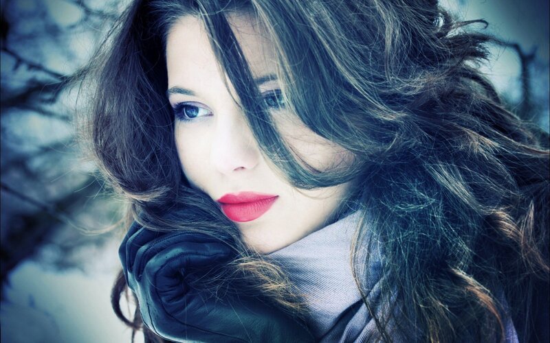 woman in winter with red lips