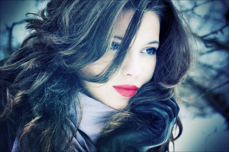woman in winter with red lips
