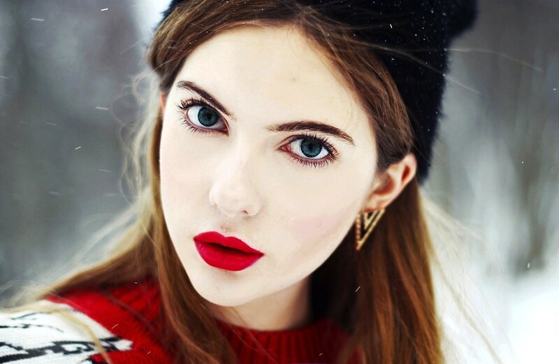 woman in winter with red lipstick