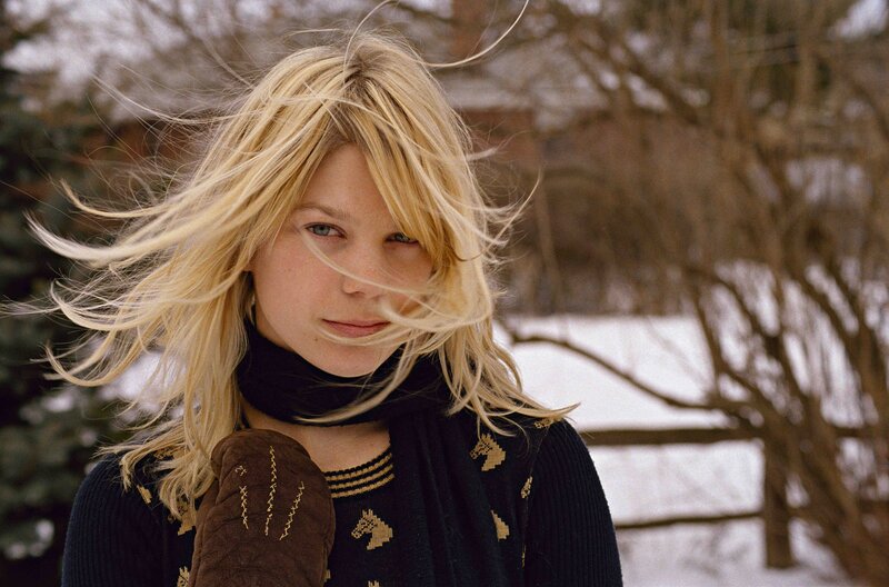 woman in winter with wind-blown hair