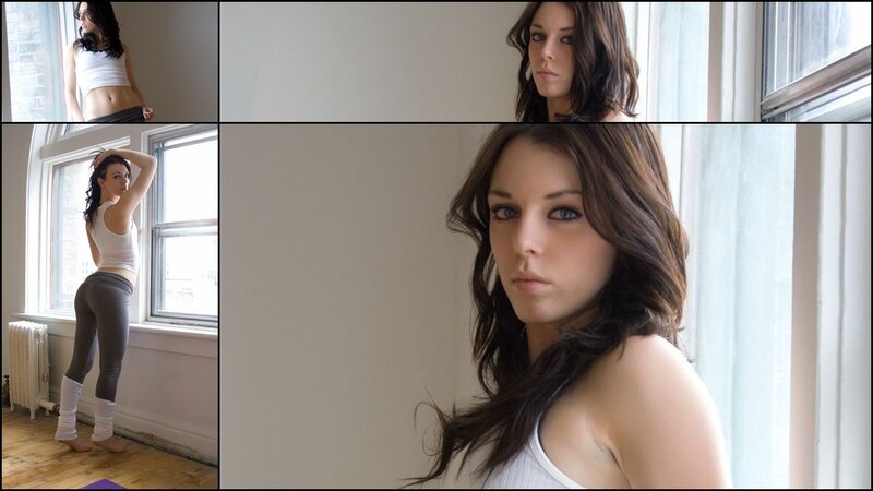 woman in workout clothes by window