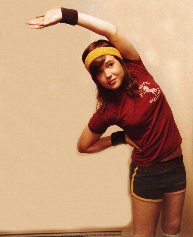woman in workout gear stretching