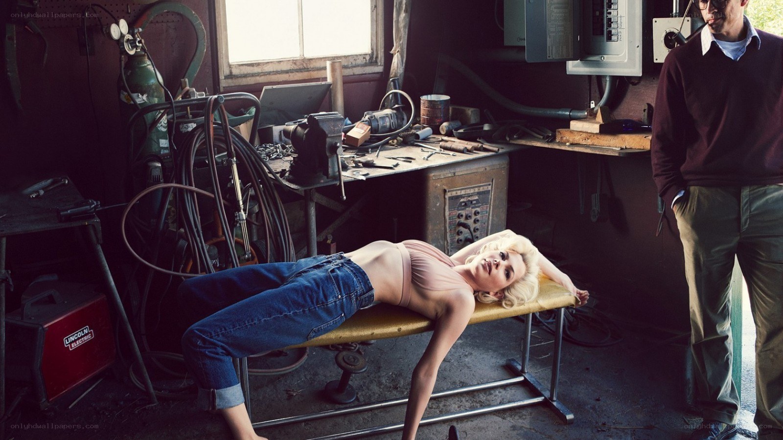 Woman in workshop with man