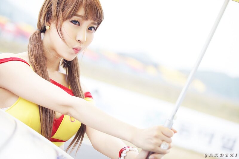woman in yellow and red outfit