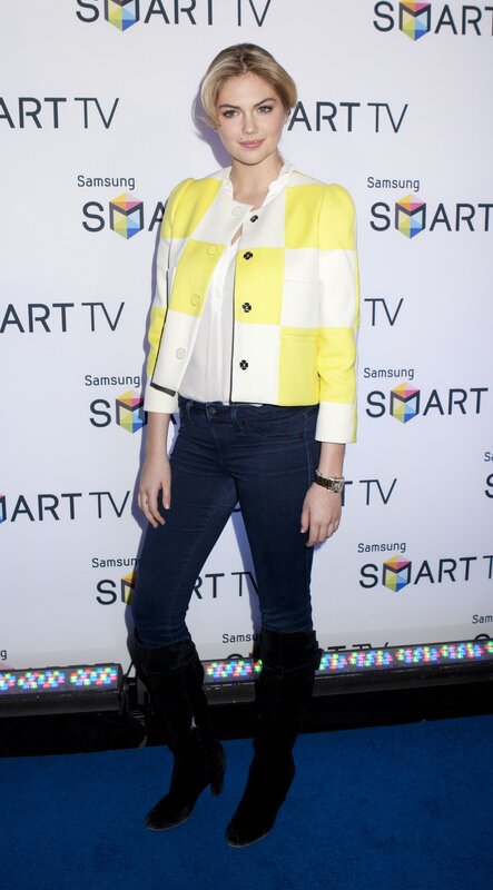 woman in yellow and white jacket