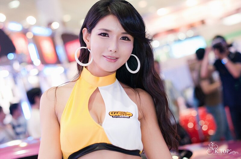 woman in yellow and white top