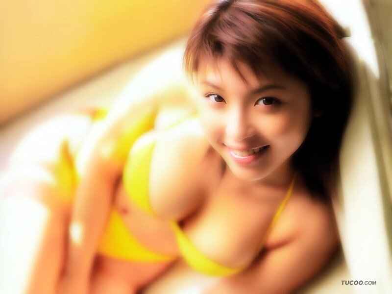 woman in yellow bikini smiling