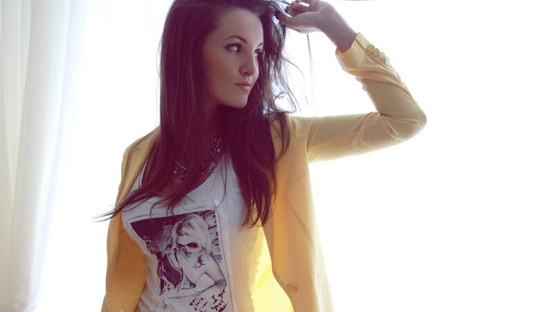 woman in yellow blazer