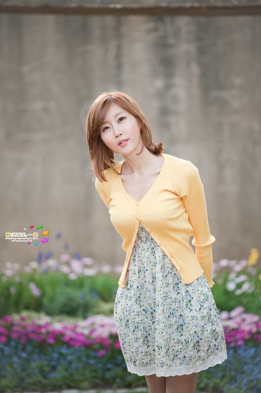 woman in yellow cardigan