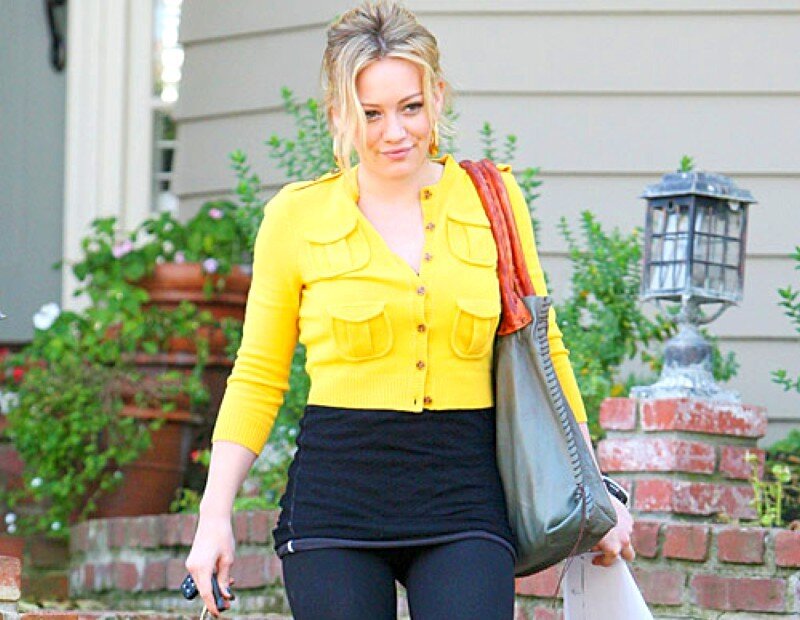 woman in yellow cardigan