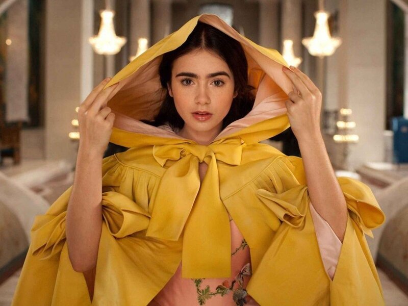 woman in yellow cloak
