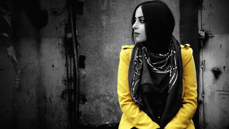 woman in yellow coat