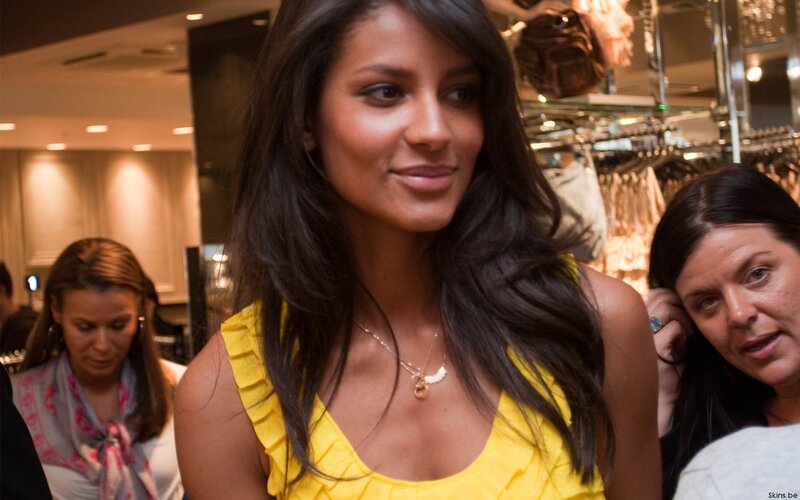 woman in yellow dress at event