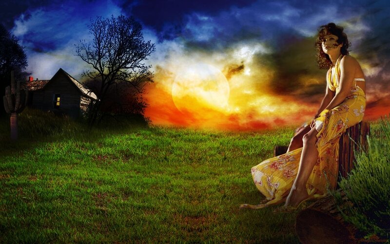 Woman in yellow dress at sunset
