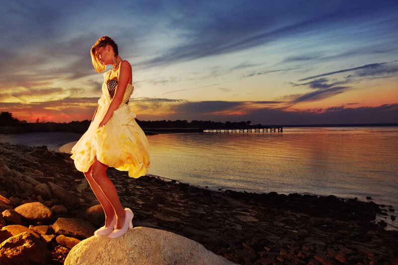 Woman in Yellow Dress — Dramatic, Sunset, Photograph, Rocks