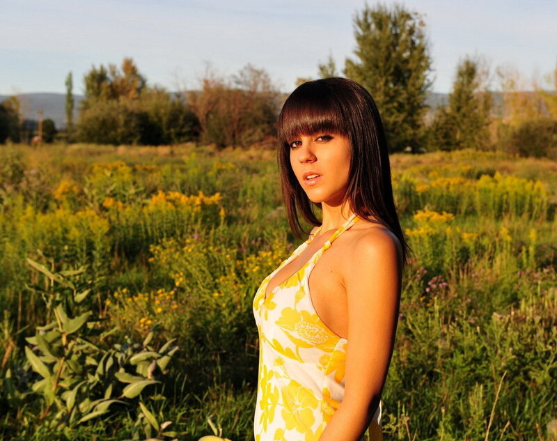 woman in yellow dress in field