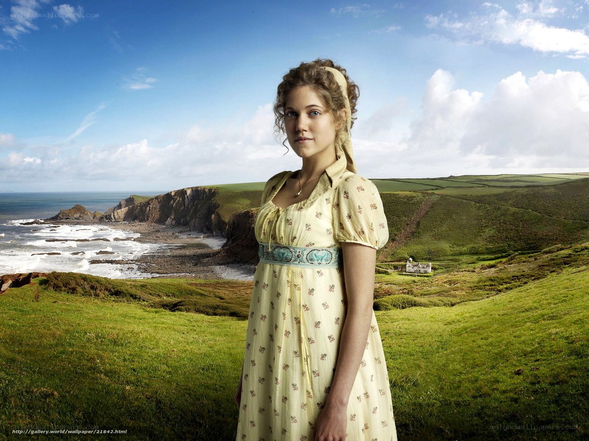 woman in yellow dress on coast
