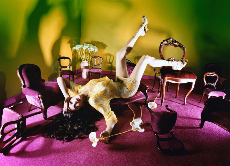 woman in yellow dress on floor