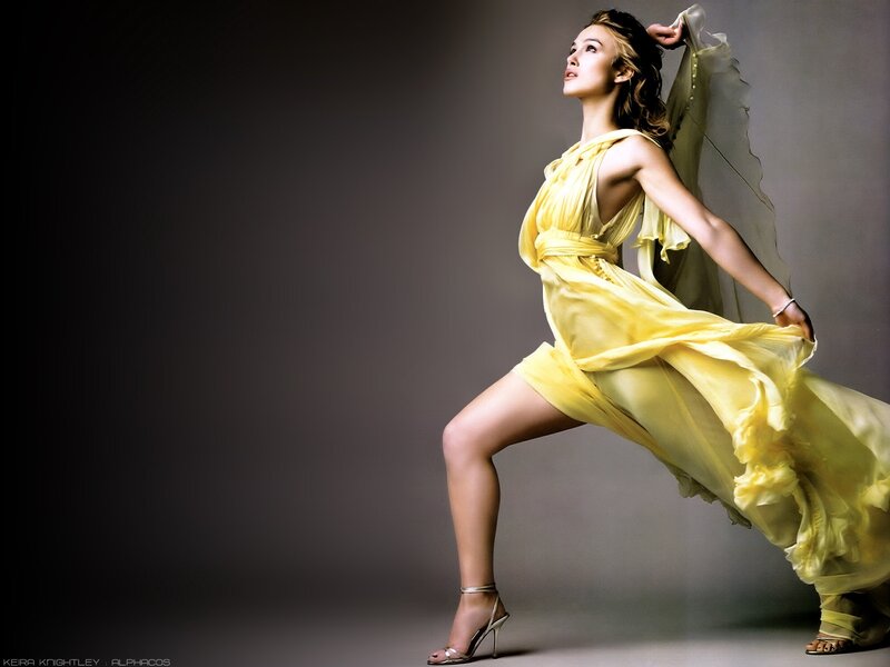 woman in yellow dress posing