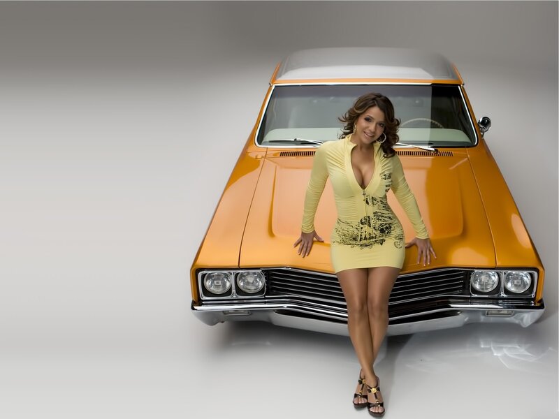 woman in yellow dress with classic car