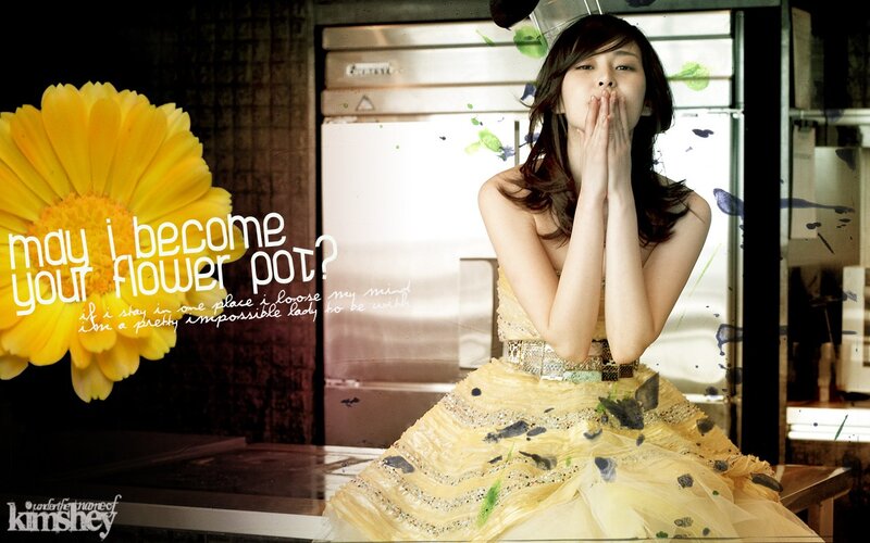 woman in yellow dress with flower