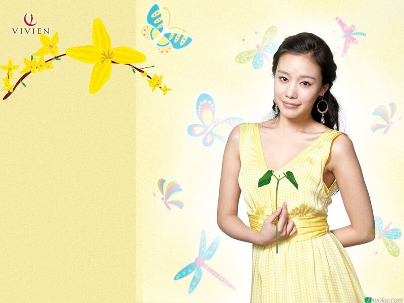 Woman in yellow dress with flowers