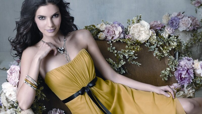 Woman in yellow dress with flowers