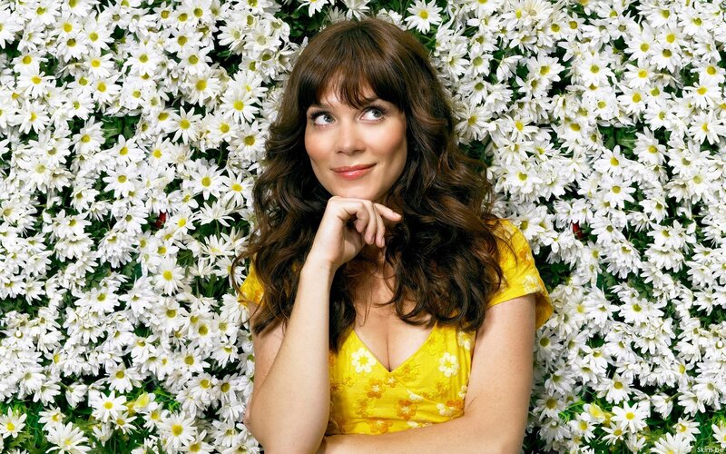 Woman in yellow dress with flowers
