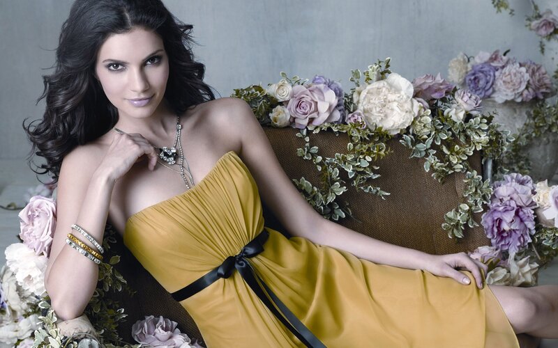 Woman in yellow dress with flowers