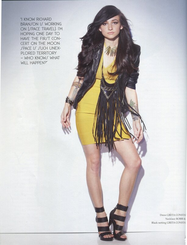 Woman in yellow dress with fringe