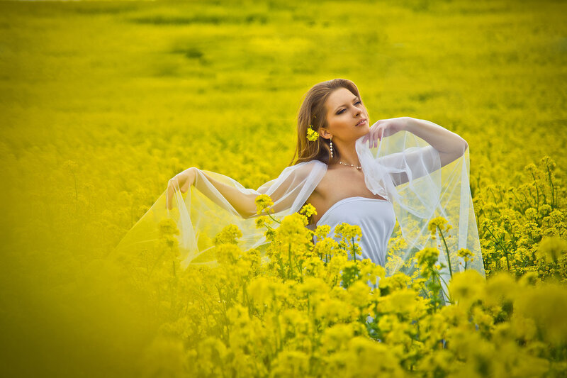 Woman in Yellow Field — Serene, Afternoon, Photograph, Yellow Flowers, White Dress