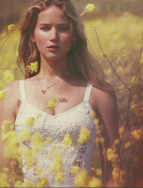 woman in yellow flower field