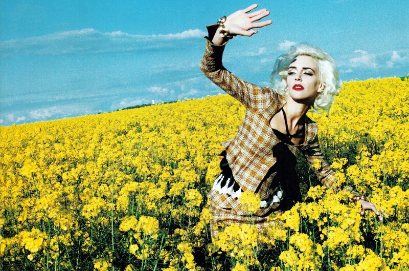 woman in yellow flower field