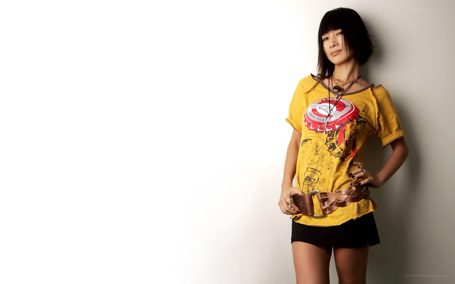woman in yellow graphic tee