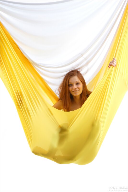 woman in yellow hammock