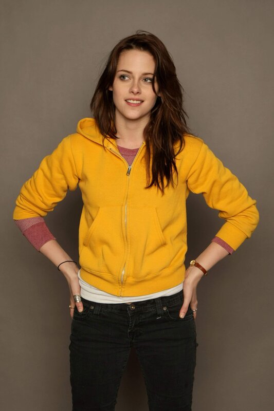 woman in yellow hoodie