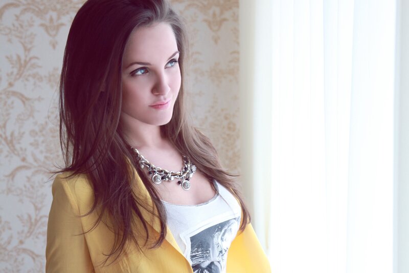 woman in yellow jacket