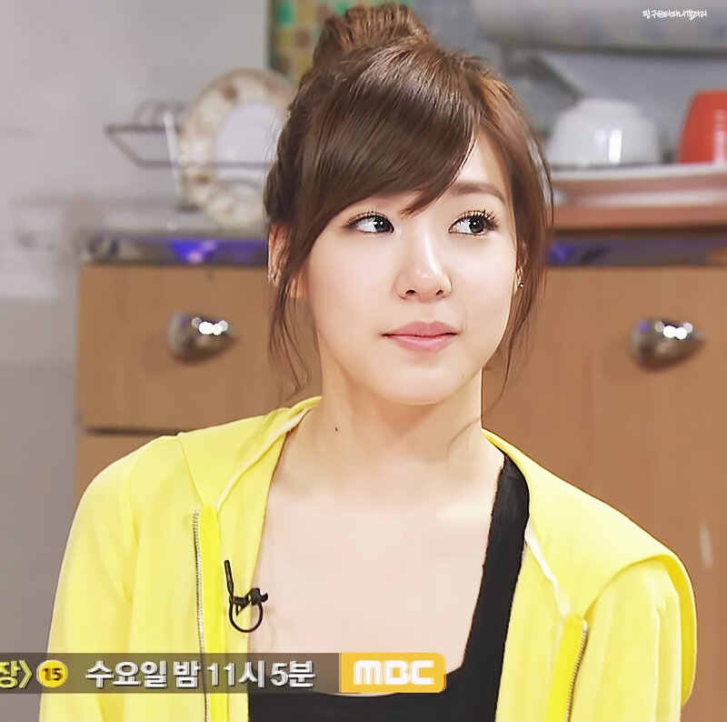 woman in yellow jacket