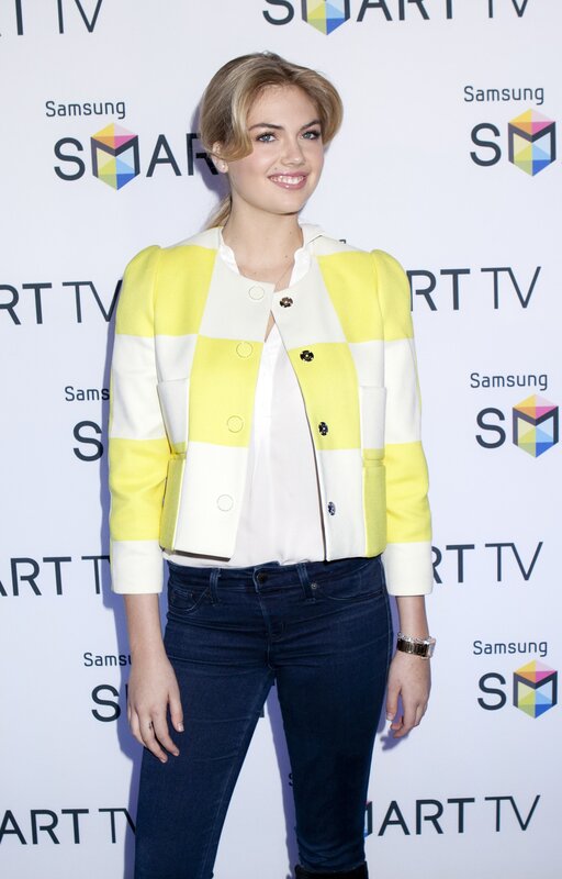 Woman in Yellow Jacket — Neutral, Photograph, Jeans, Watch, Backdrop