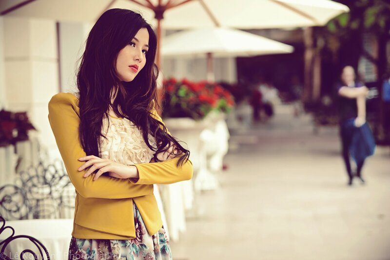 woman in yellow jacket outdoors