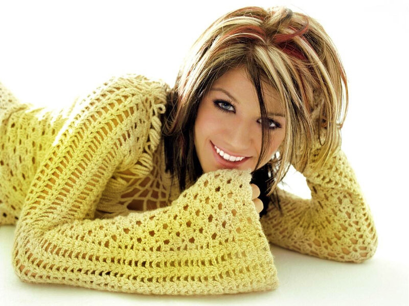 woman in yellow knit sweater