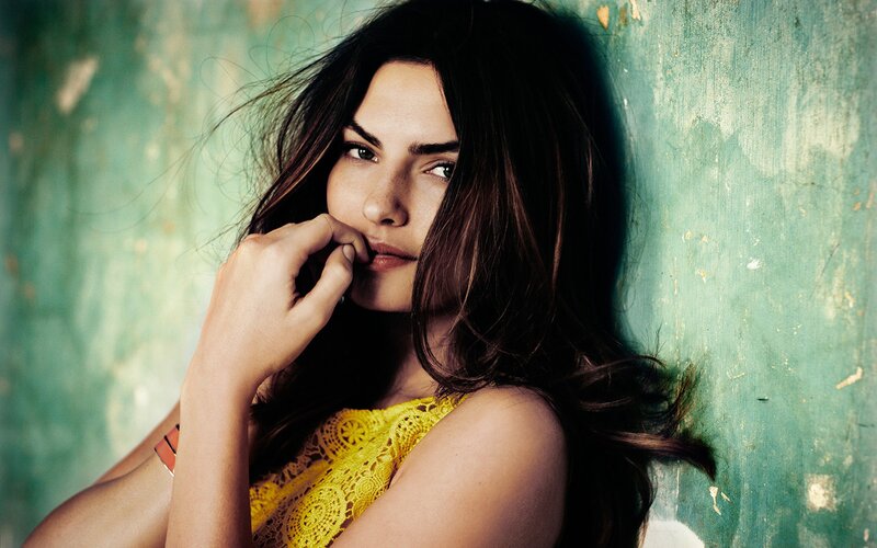 woman in yellow lace top