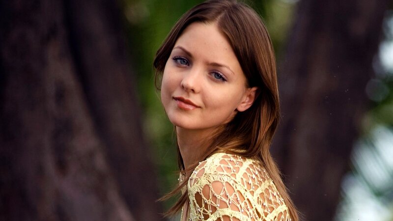 woman in yellow lace top