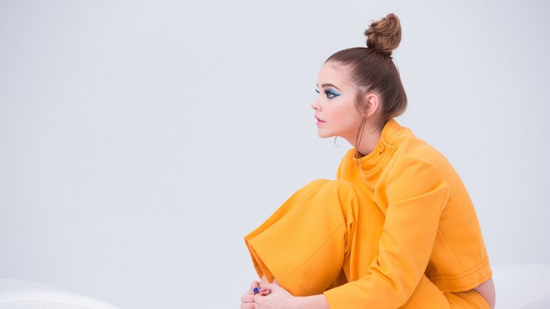 woman in yellow outfit
